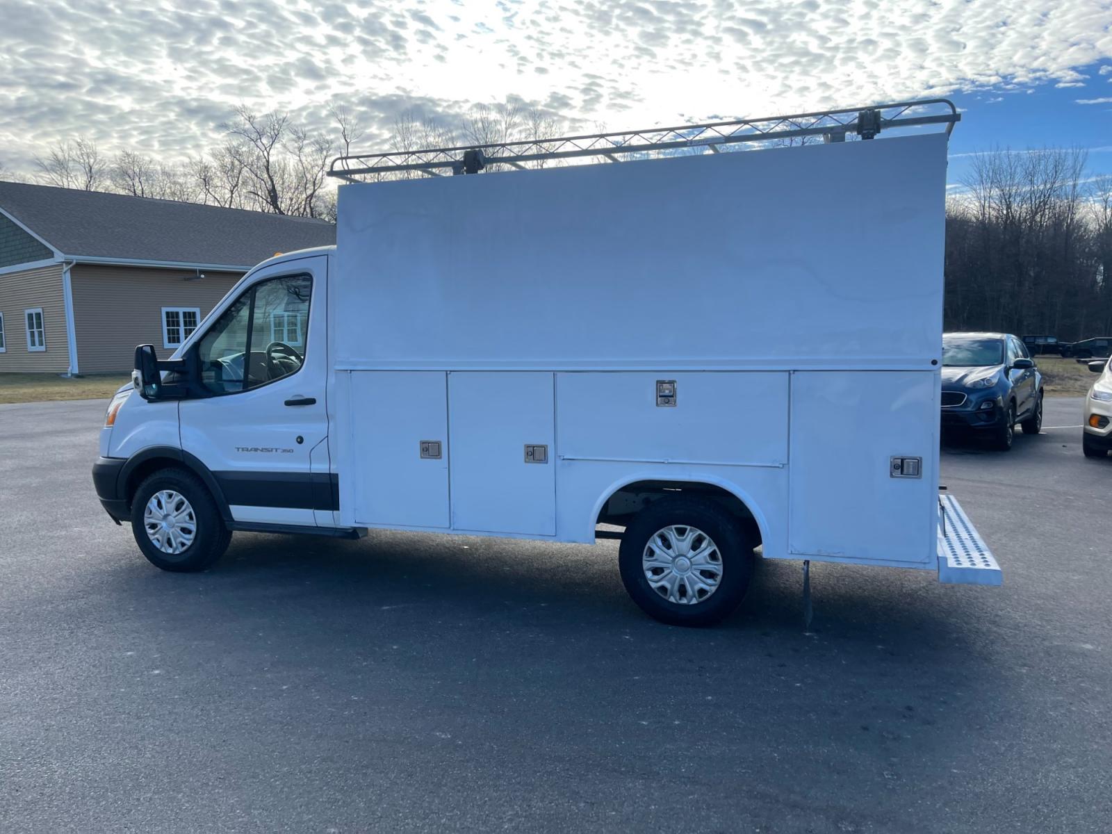 2018 White /Black Ford Transit T-350 (1FDBW5PM5JK) with an 3.7L V6 DOHC 24V engine, 6 Speed Automatic transmission, located at 11115 Chardon Rd. , Chardon, OH, 44024, (440) 214-9705, 41.580246, -81.241943 - This 2018 Ford T-350 Cutaway with a utility box is a versatile commercial vehicle powered by a 3.7-liter V6 engine. It's equipped with a 4.10 gearing ratio and a limited-slip rear differential, which helps to improve traction and handling under various conditions. This model boasts substantial hauli - Photo #12